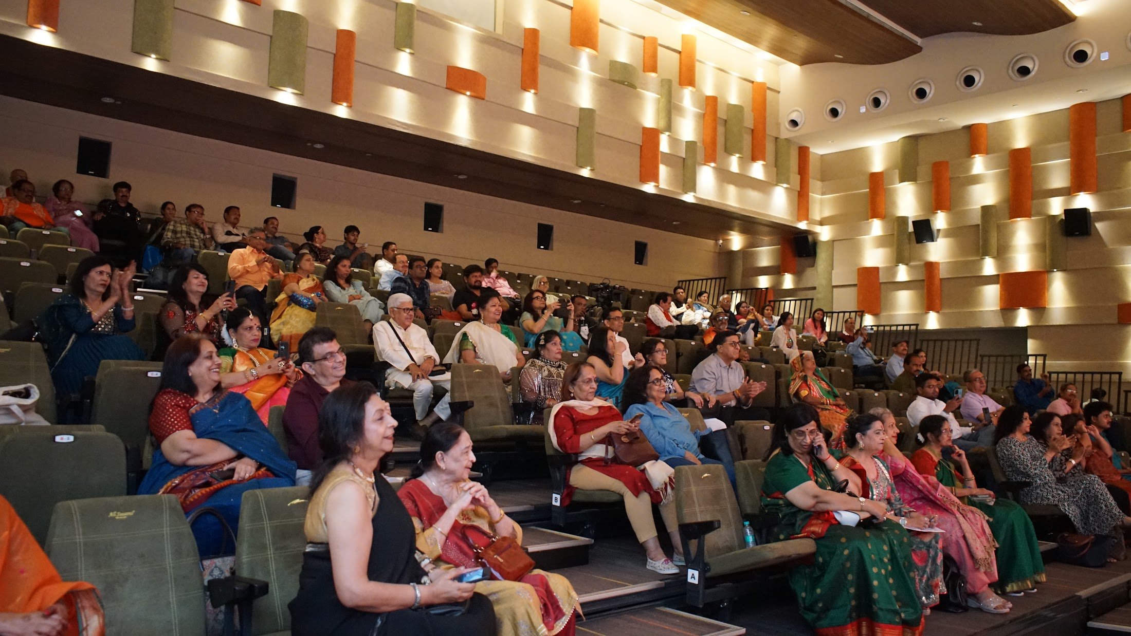 Audience watching a stage performance