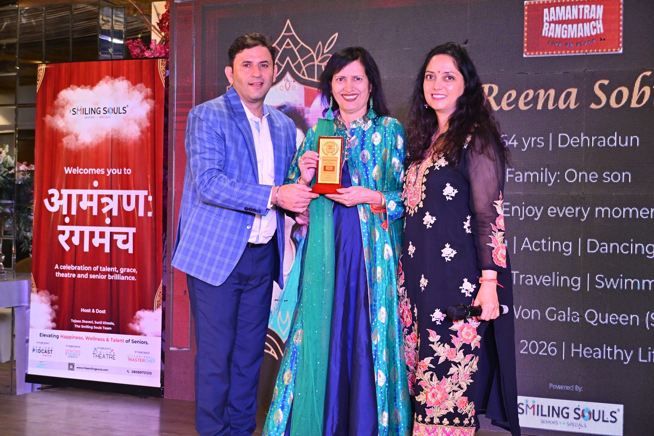 A finalist receiving her award